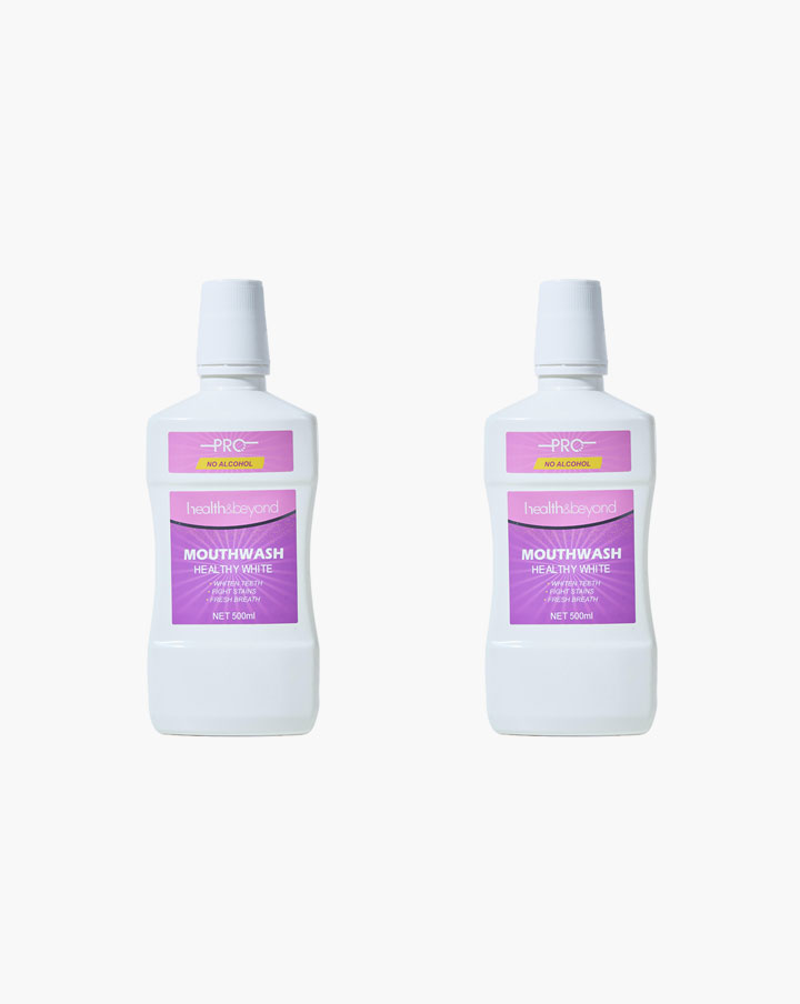 Здоровый белый ополаскиватель для полости рта